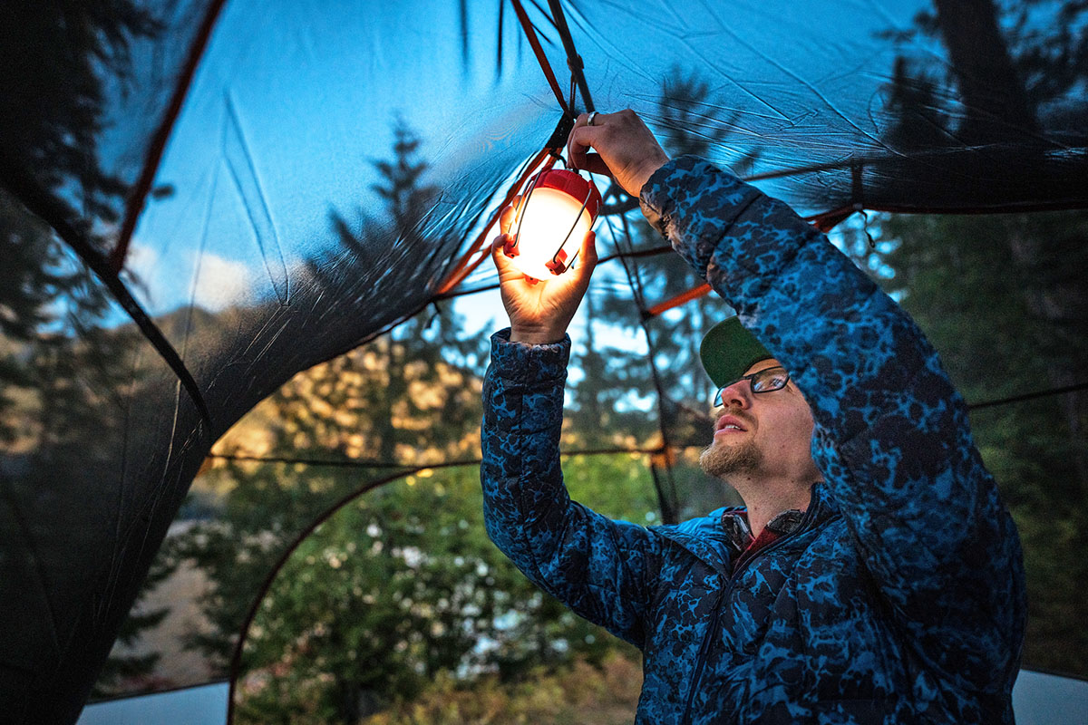 The North Face ThermoBall Eco Hoodie (hanging lantern inside REI Grand Hut tent)